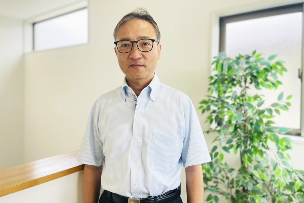 米澤　九州男