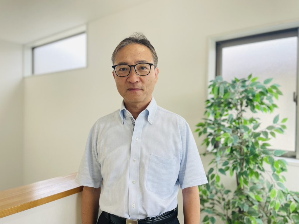 米澤　九州男